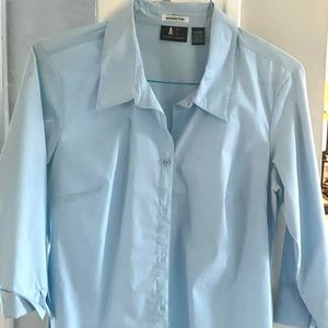 An Xl button down shirt with 3/4 sleeves.